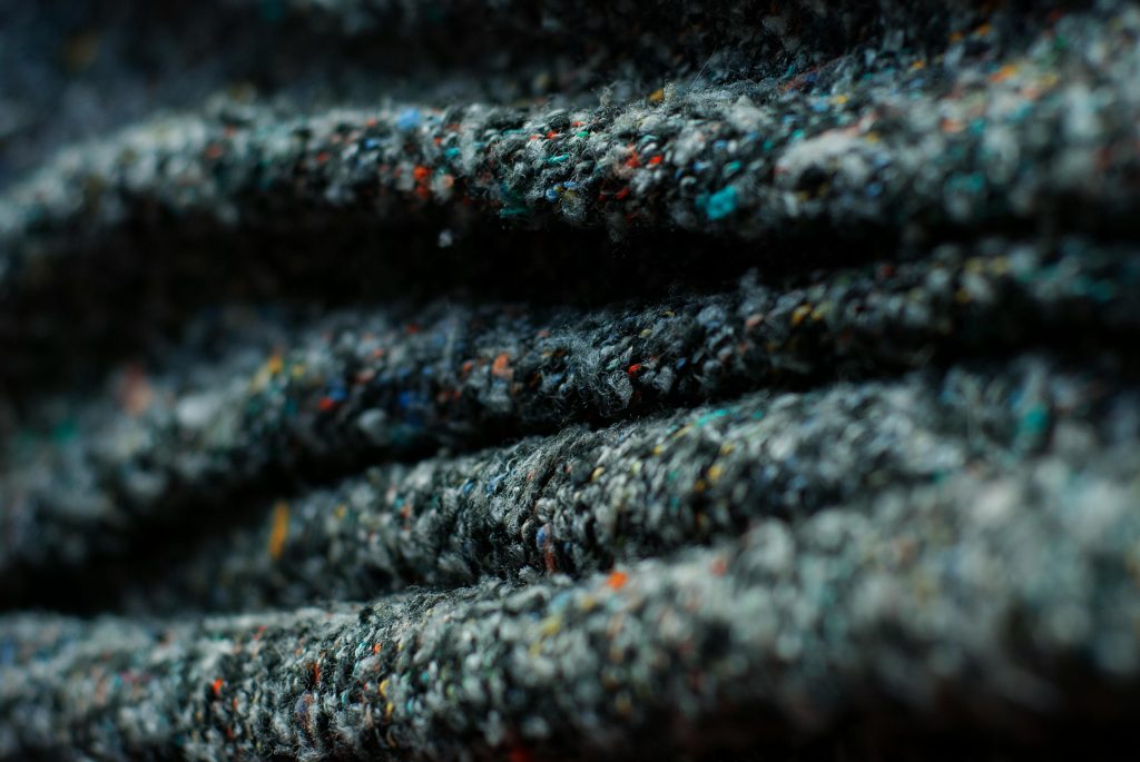 pexels-photo-30573902-30573902 Detailed view of multicolored woolen fabric texture, showcasing pattern and colors.